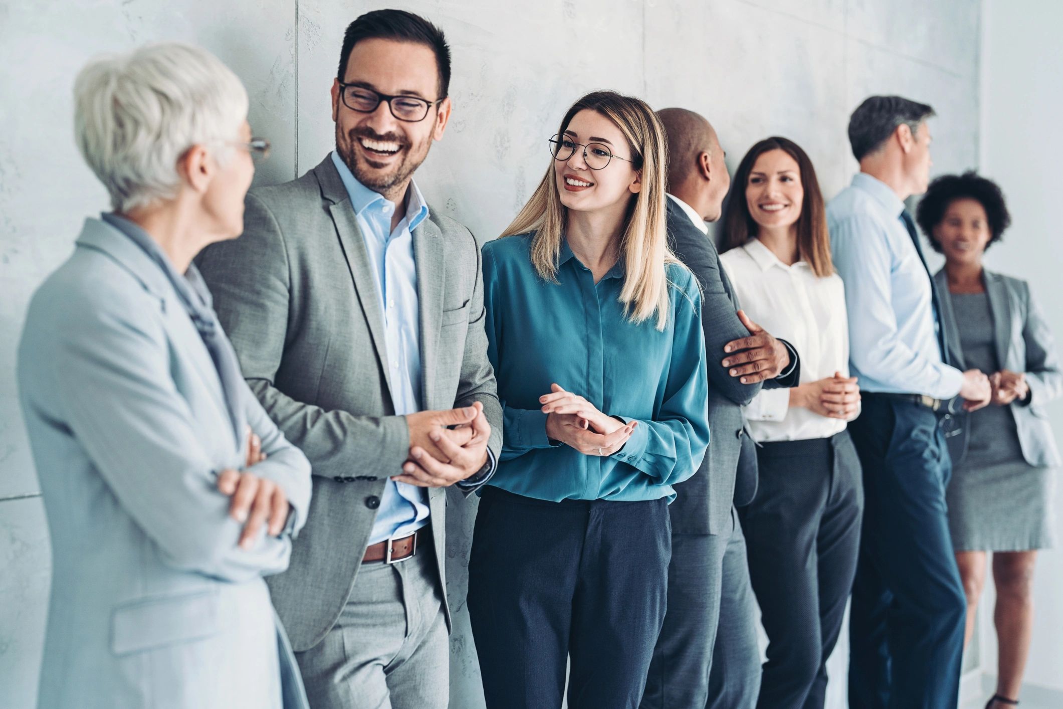 Professionals collaborating at a business event