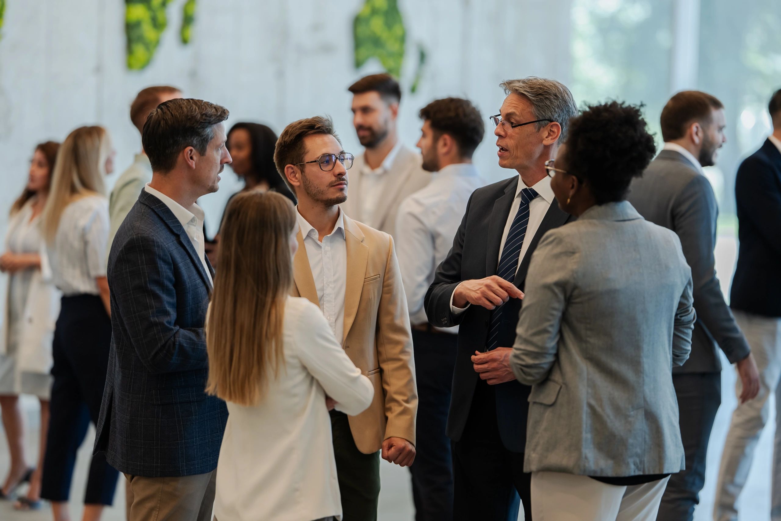 Professionals networking at a business event